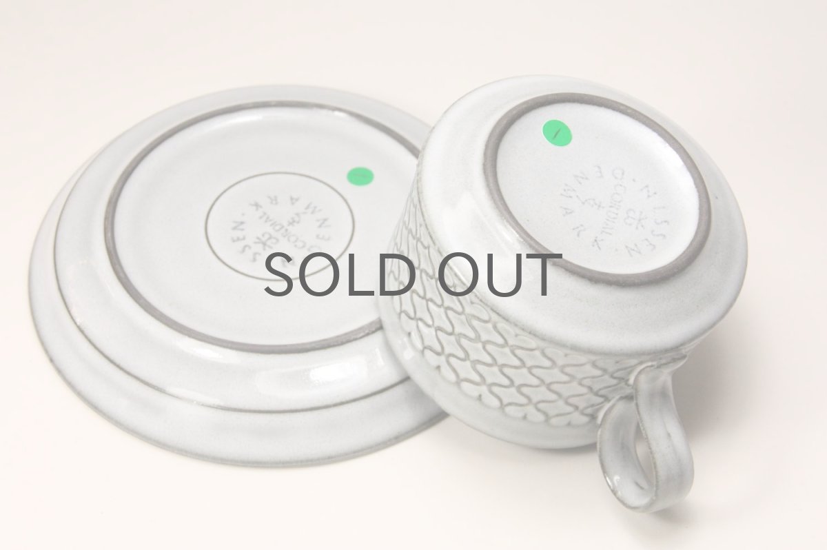 グリーンの丸は識別番号のシールです