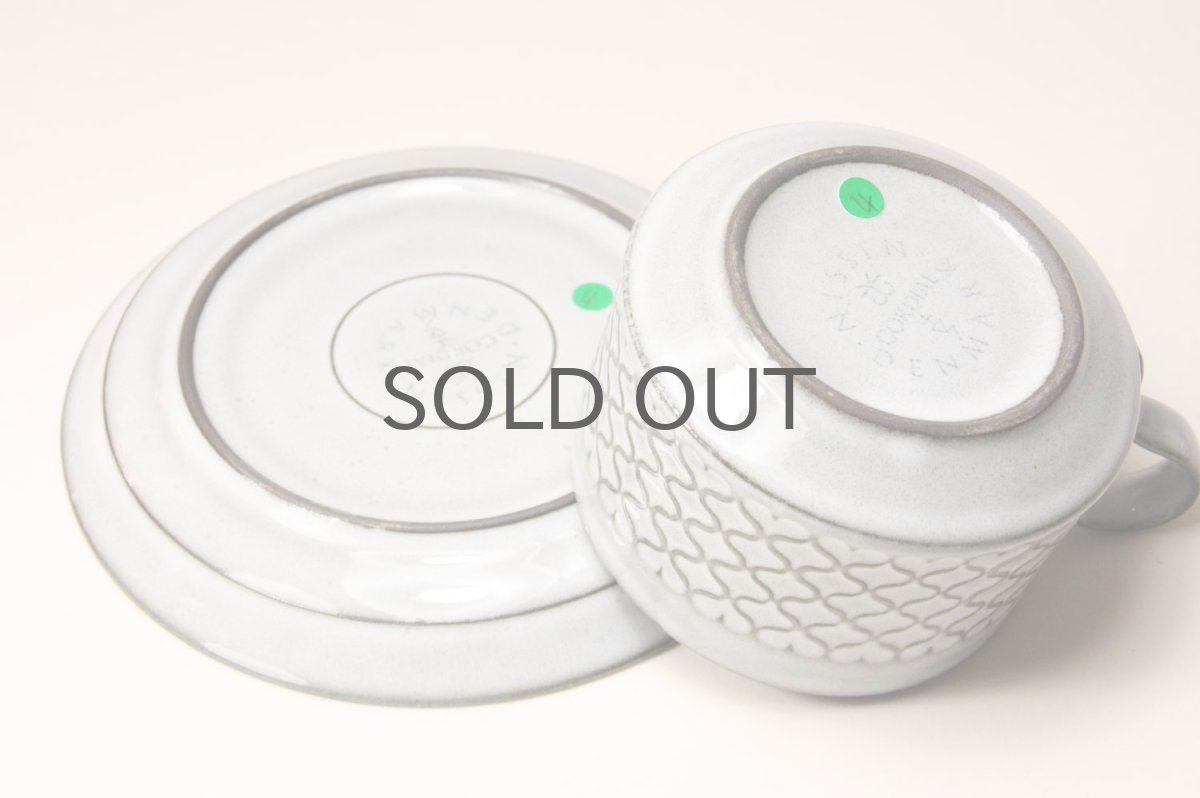 グリーンの丸は識別番号のシールです